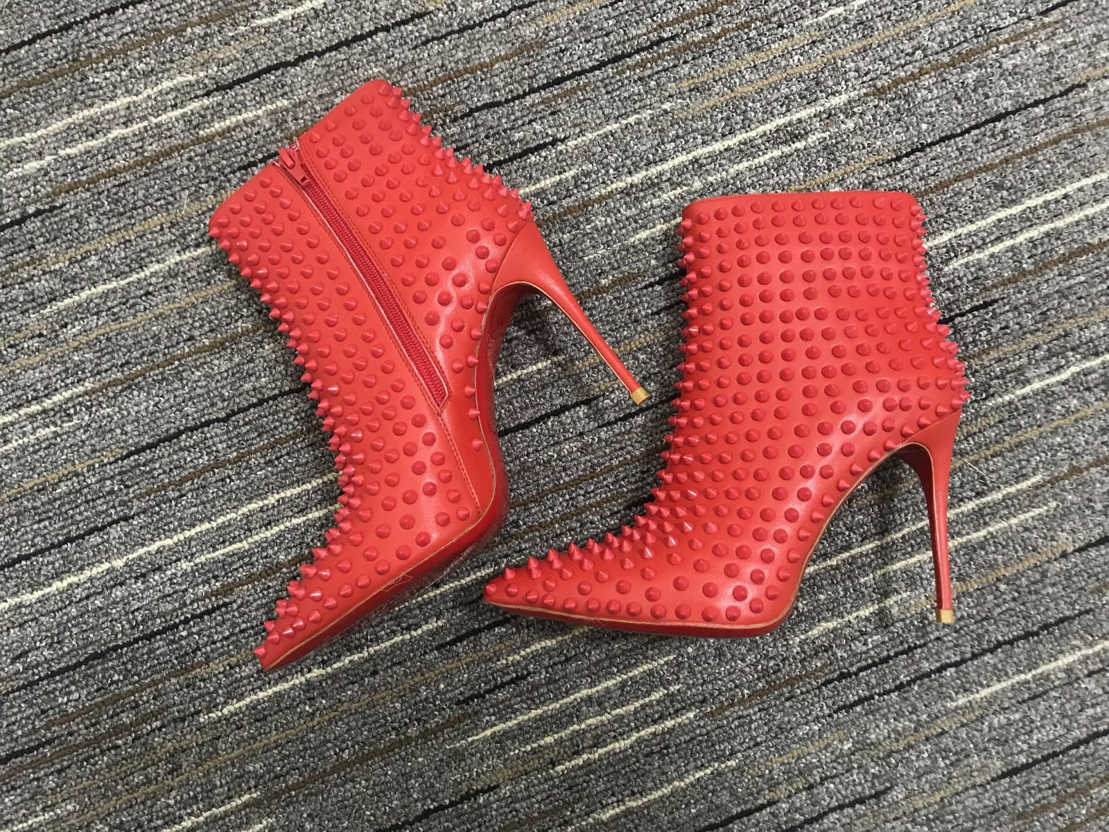 christian_louboutin_snakilta_spiked_ankle_boots_100mm_calf_leather_red_1